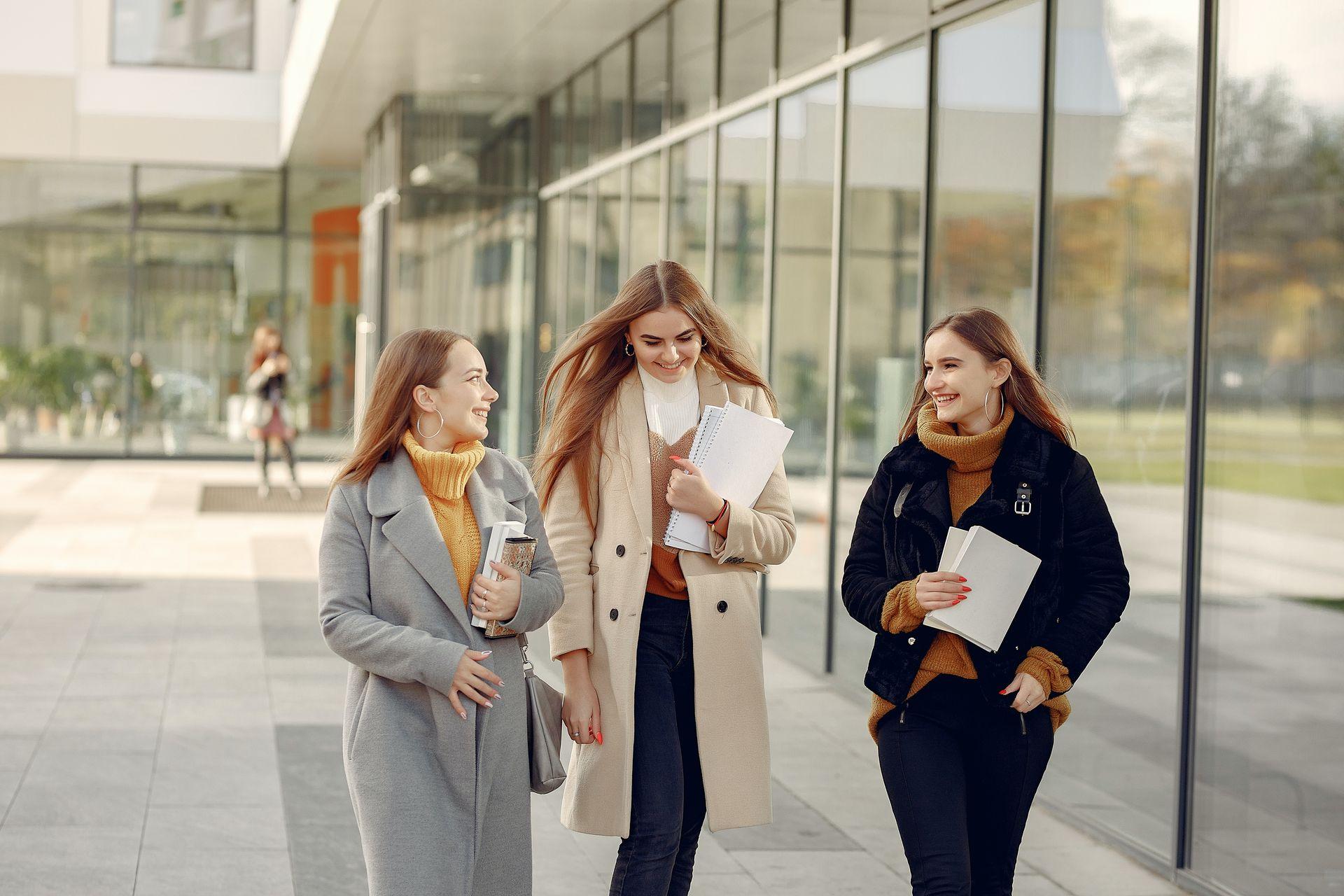 Female students walking Female students walking